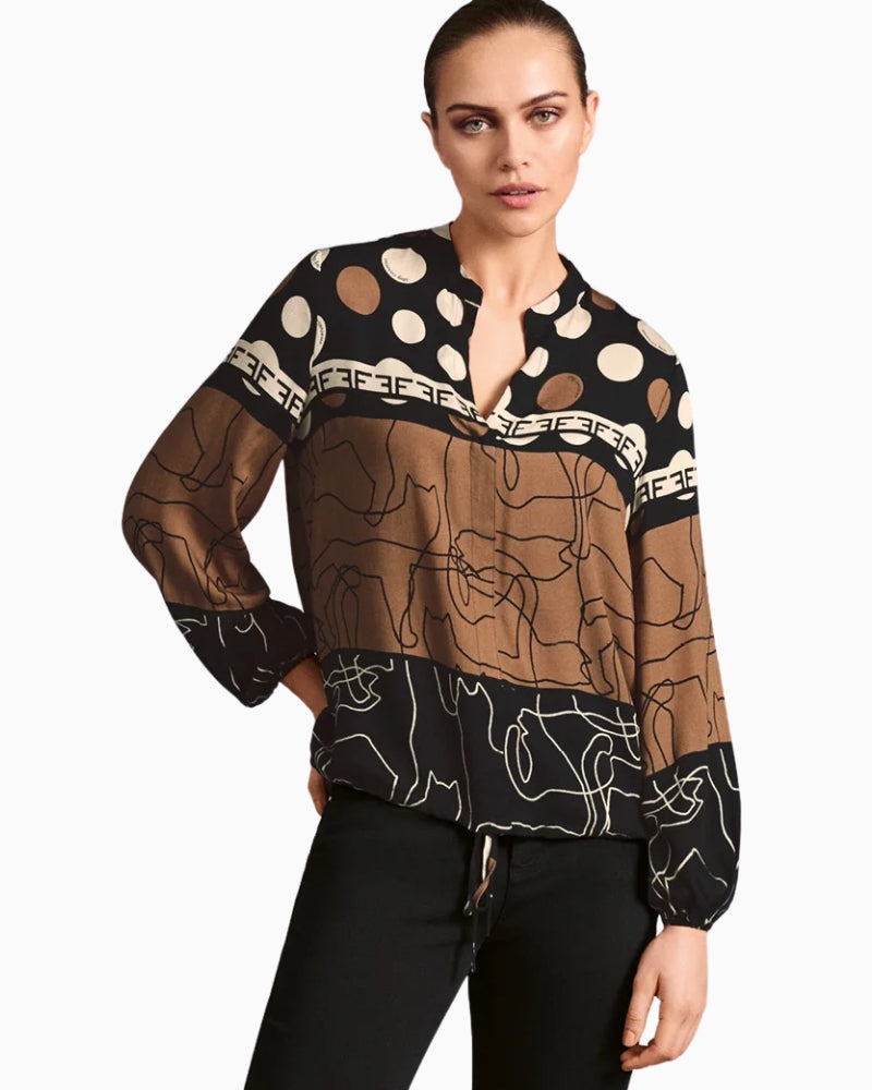 V-neck blouse by Faber in exclusive black, camel and cream print with stand collar