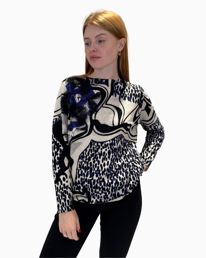 Front view of Faber Woman mixed print jumper with abstract and animal patterns