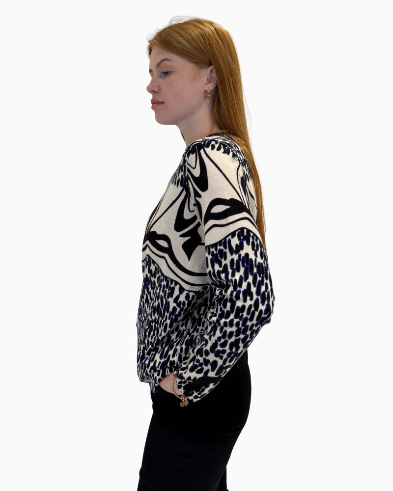 Side profile of the Faber Woman jumper showing the fit and boat neckline