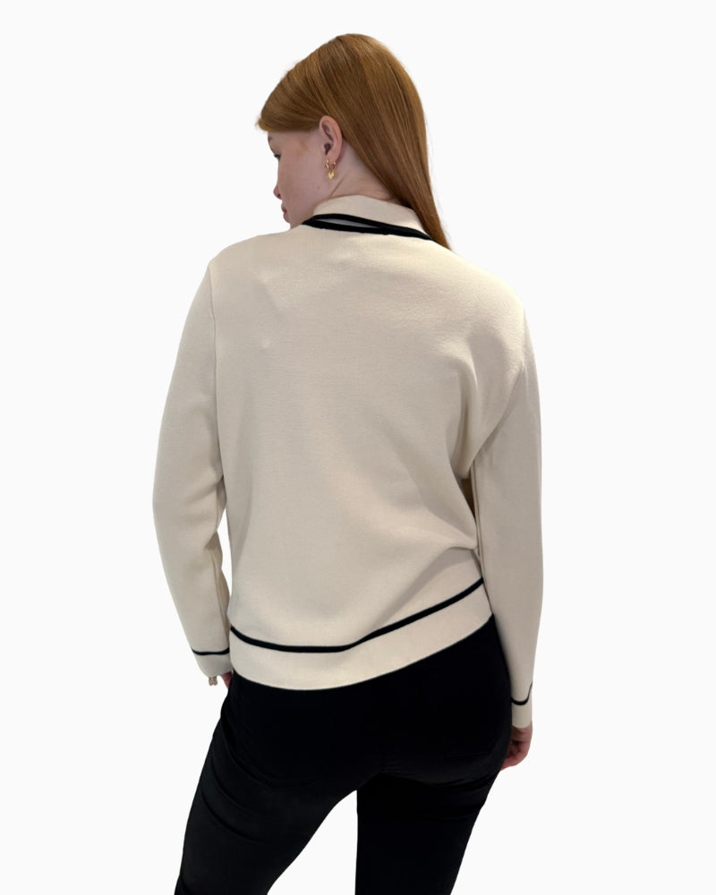 Back view of Faber cream cardigan showing clean knit finish