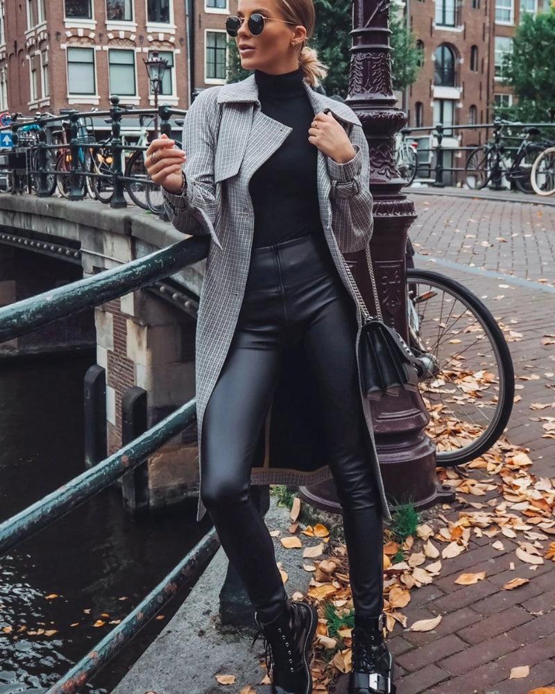 Sleek high-waisted full-length pants in black faux leather by Freddy