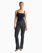 Freddy cropped faux leather trousers in black with high waist and flared leg