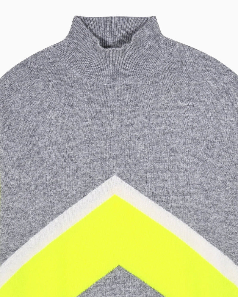 Detail of sleeve showing colour block design and fine cashmere weave