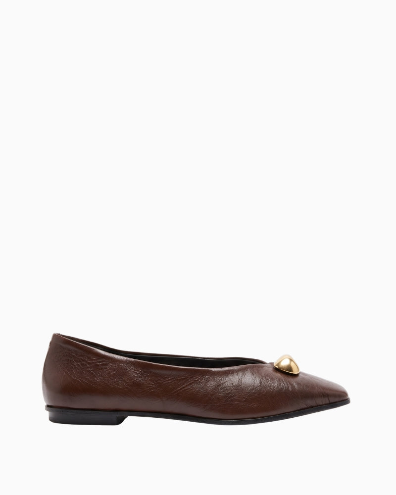 Gaimo Adea Ballerina Flat in chocolate brown suede, side view showing low-profile sole and gold metallic detail.