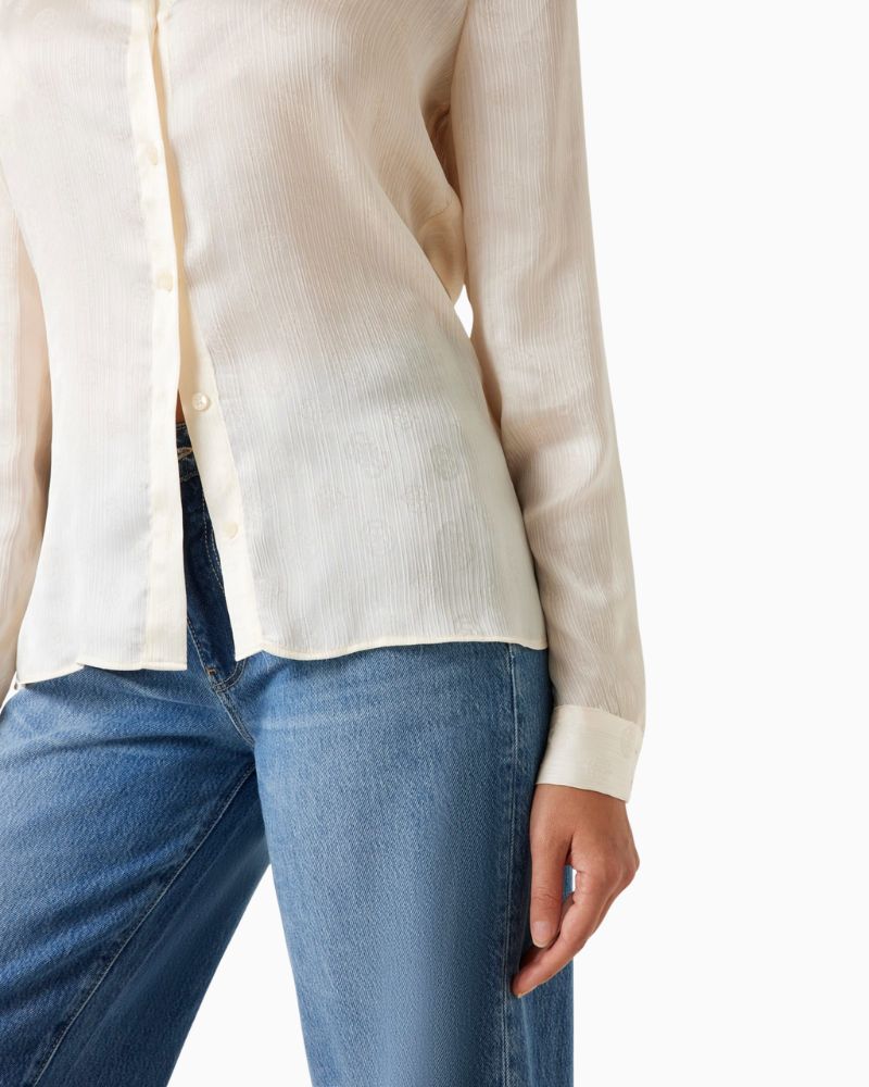 Close up of White jacquard shirt by GUESS with 4G and peony logo detail