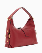 Side view of Camden red shoulder bag showing structured design and handle