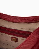 Interior of Guess Camden shoulder bag with logo lining and zip pocket