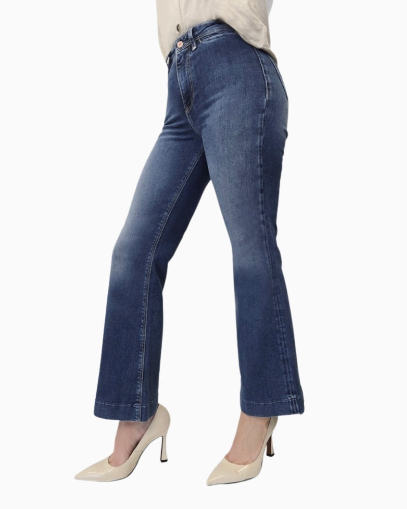 Side view of high-rise GUESS jeans with ankle flare silhouette