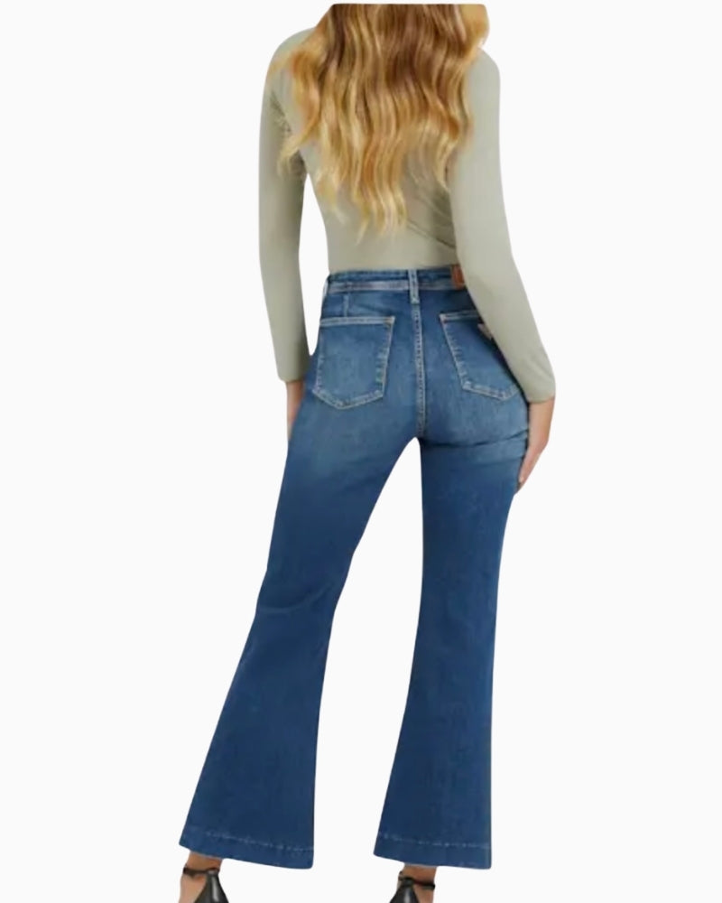 Back of GUESS Charlie jeans with branded logo label and clean flare fit