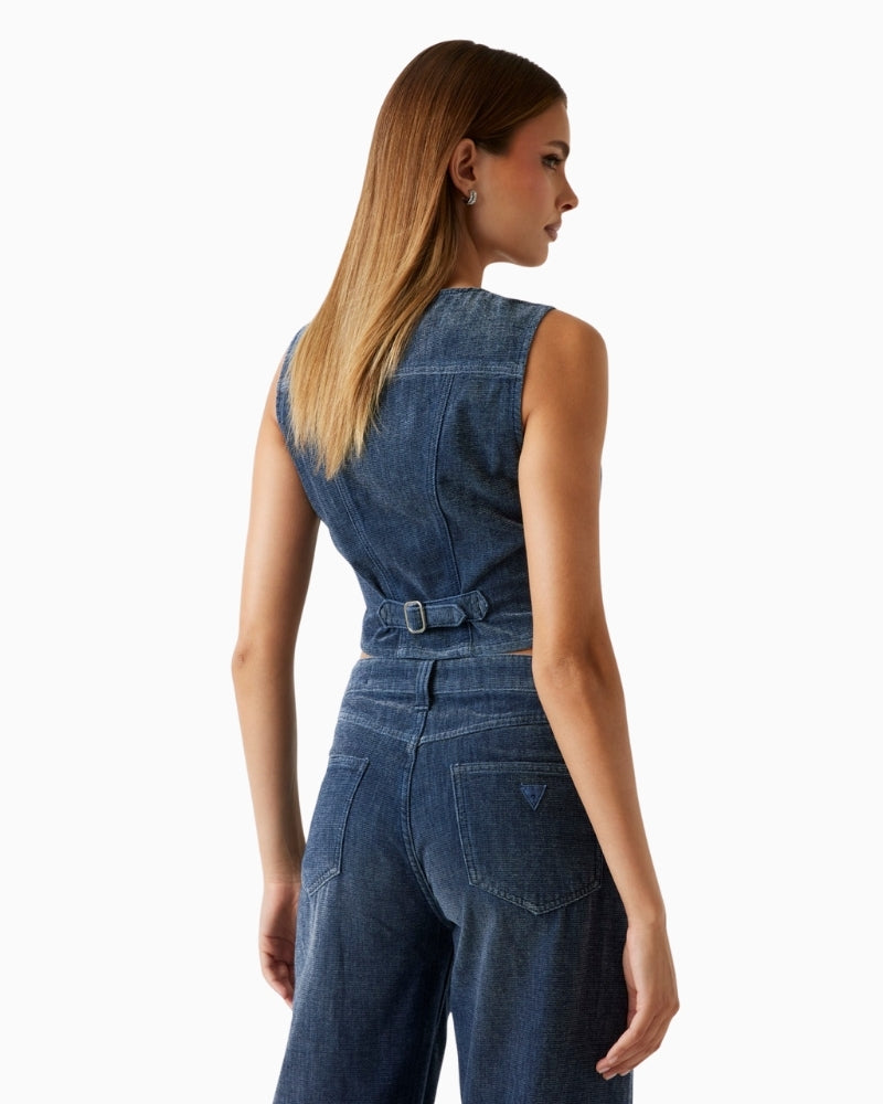 Back view of denim vest showing adjustable cinch strap