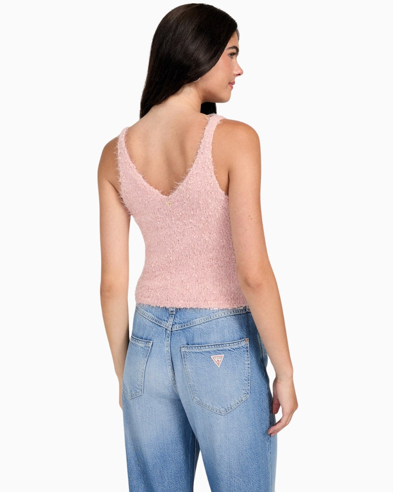 Back view of pink sleeveless top with subtle GUESS logo emblem