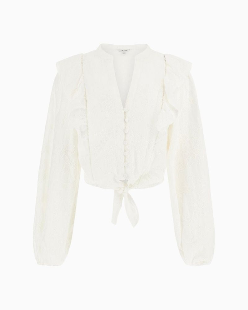 Front of Guess white cotton blouse with floral embroidery and ruffled shoulders