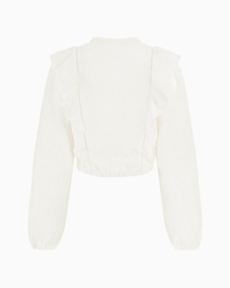 Back of Guess white cotton blouse with floral embroidery and ruffled shoulders