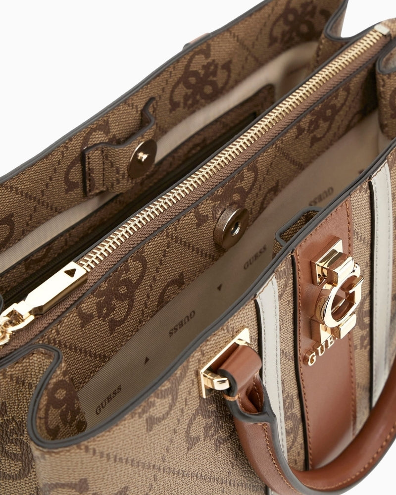 Interior view of handbag with Guess logo lining and internal zip pocket