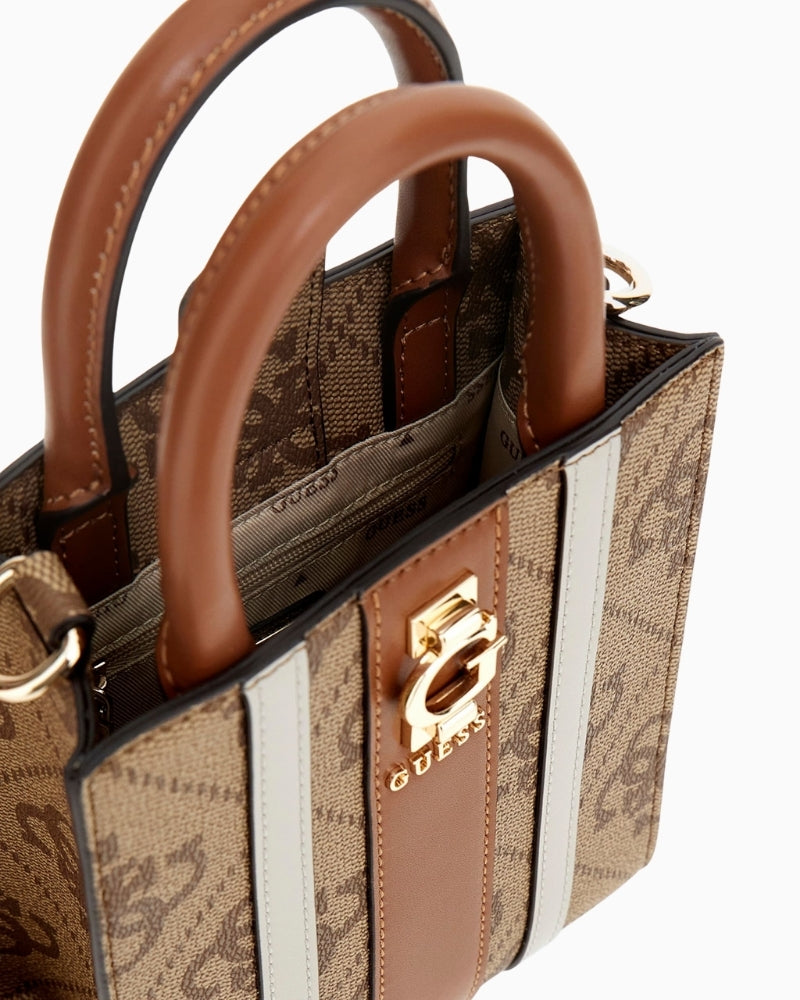 Interior of Guess mini shoulder bag with logo lining and internal zip pocket