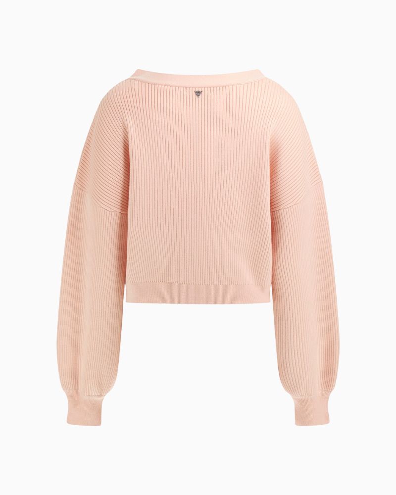 Back of Guess peach knit showing fine texture and soft drape