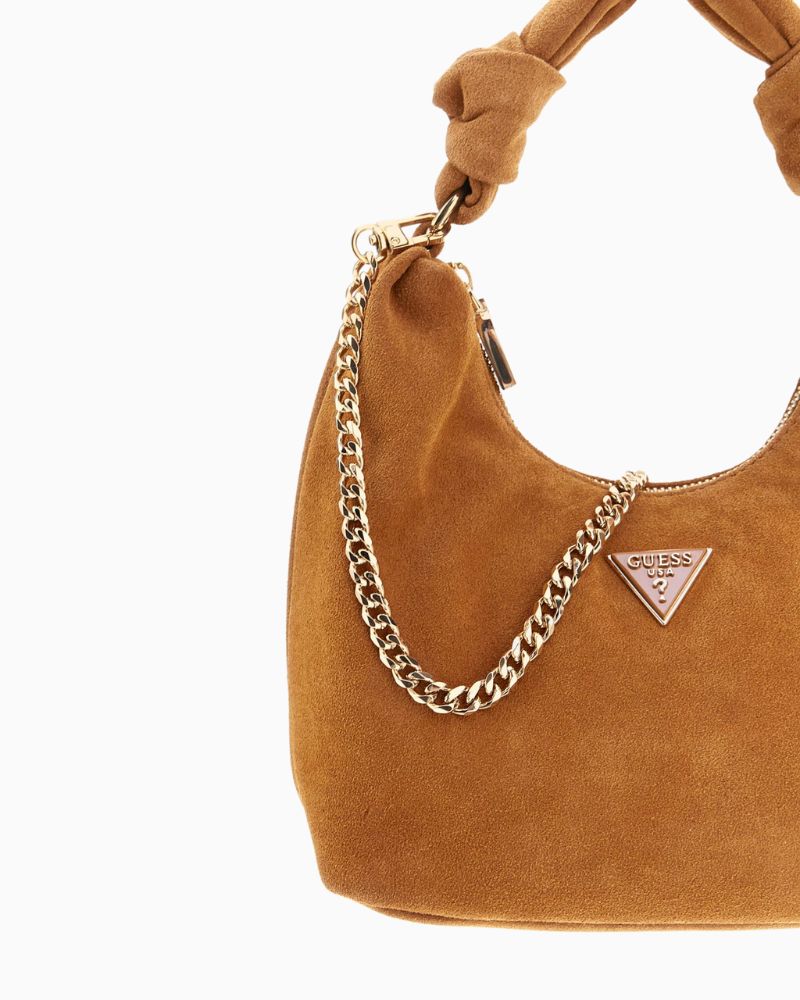 Detachable chain strap detail with gold finish and suede texture