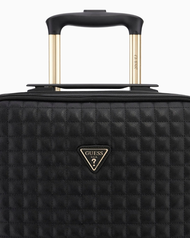 Close-up of logo detail on black Nadira travel luggage