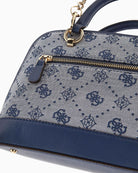 Close up of view showing detachable chain strap and structured silhouette