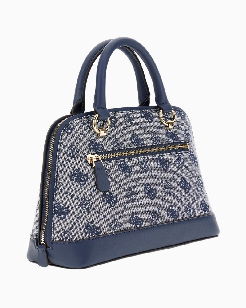 Side view showing detachable chain strap and structured silhouette