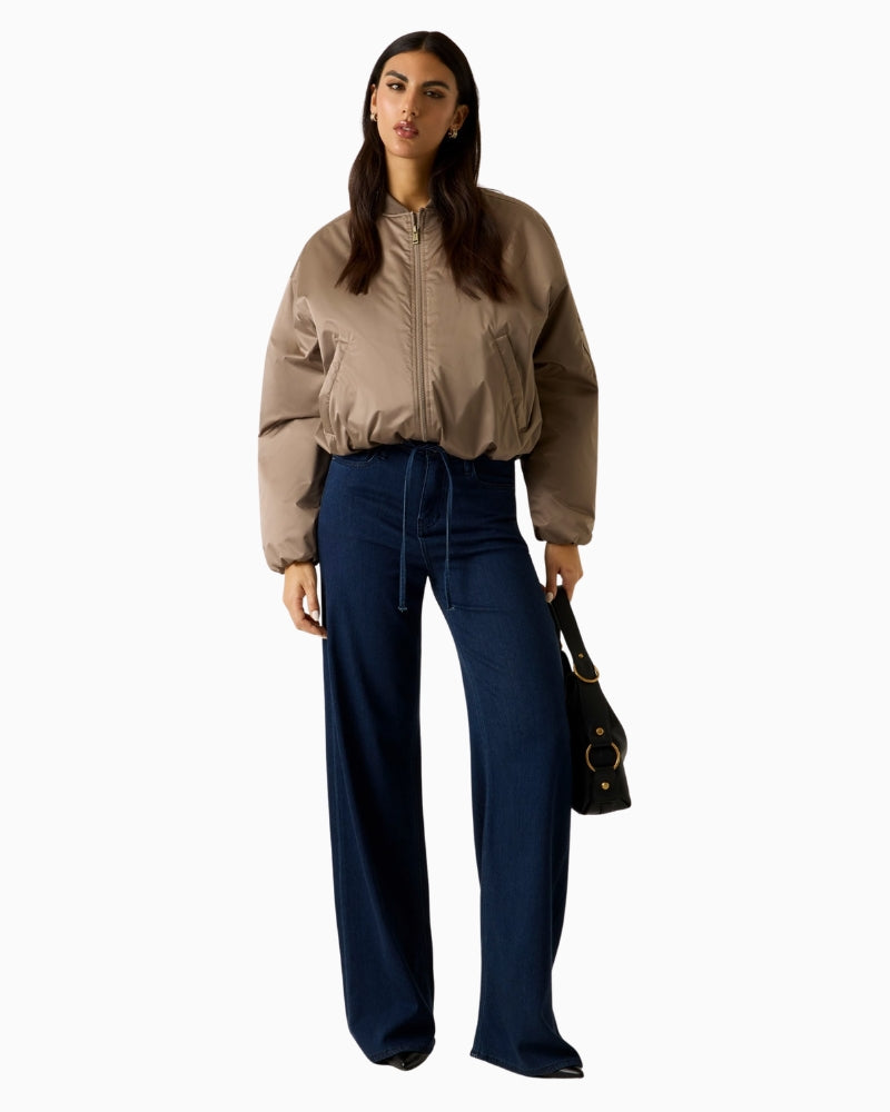 Woman wearing Guess satin bomber jacket brown – Áines Boutique