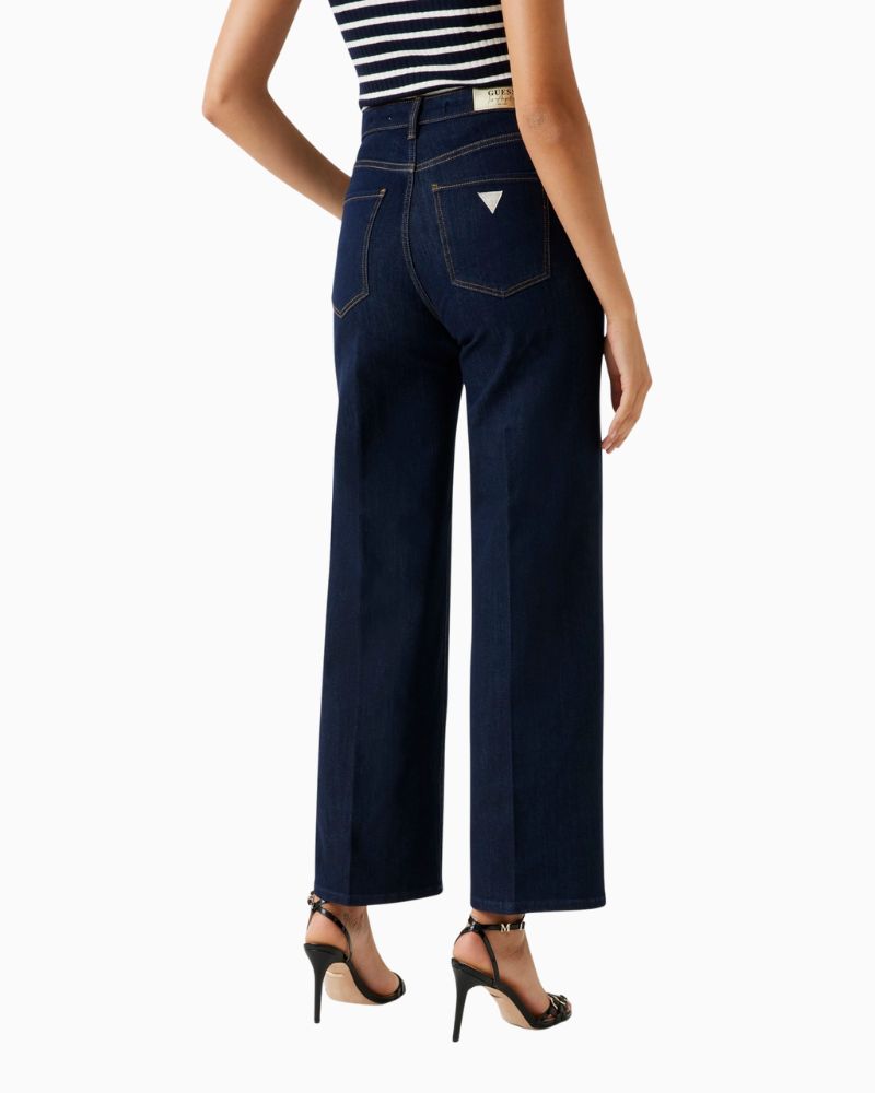 Back view of GUESS wide leg denim showing classic five-pocket design
