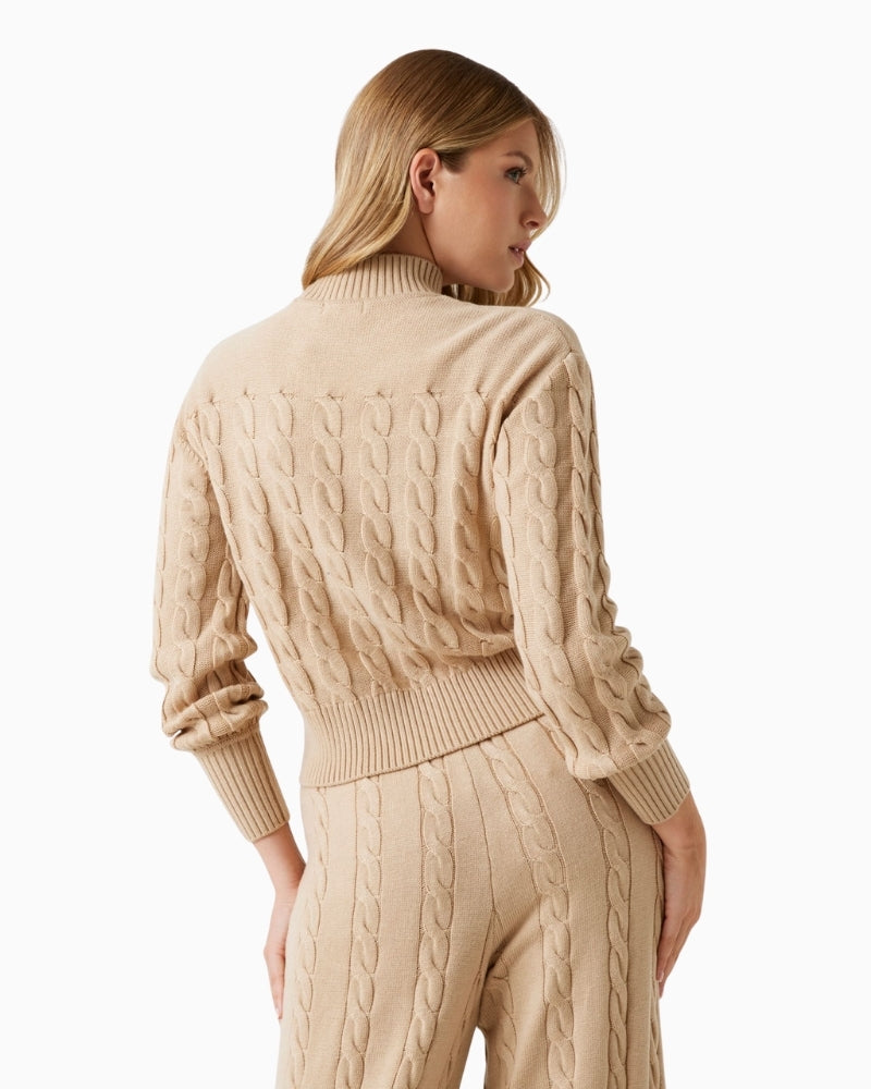 Back view of GUESS jumper showing soft texture and sculpted sleeve shape