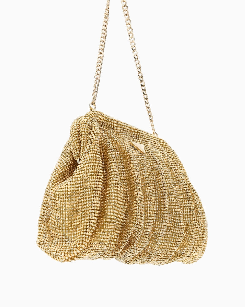 Side view of Guess clutch showing slim silhouette and shimmer