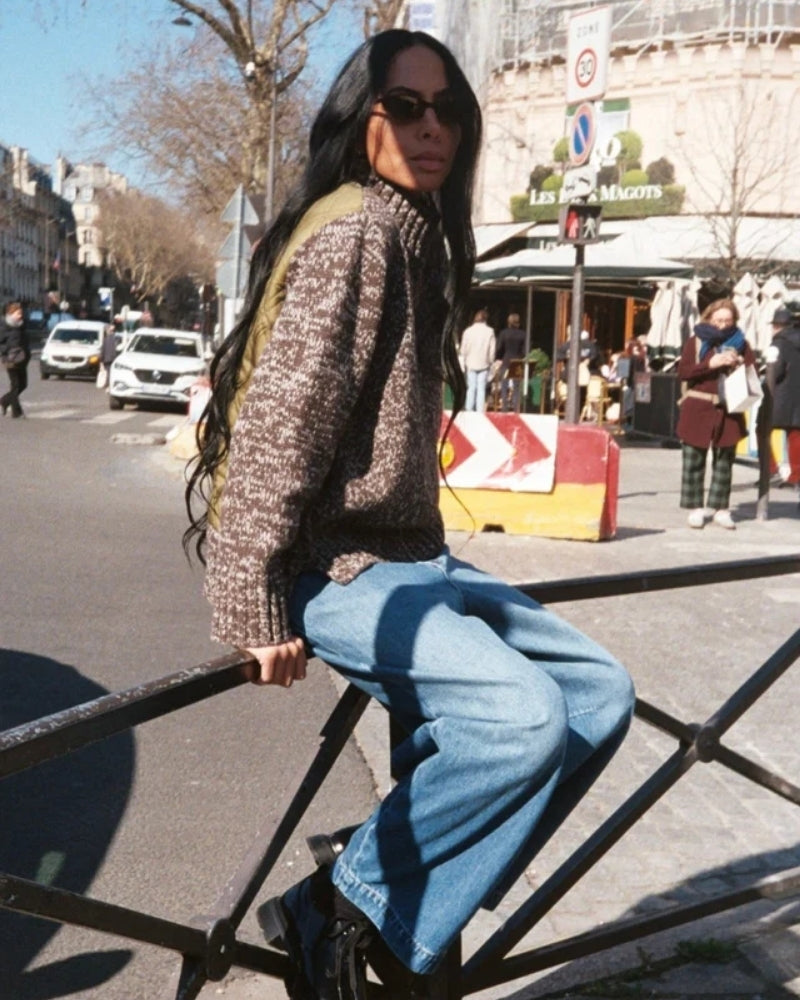 Front view of high neck HEYANNO knit with subtle logo on chest