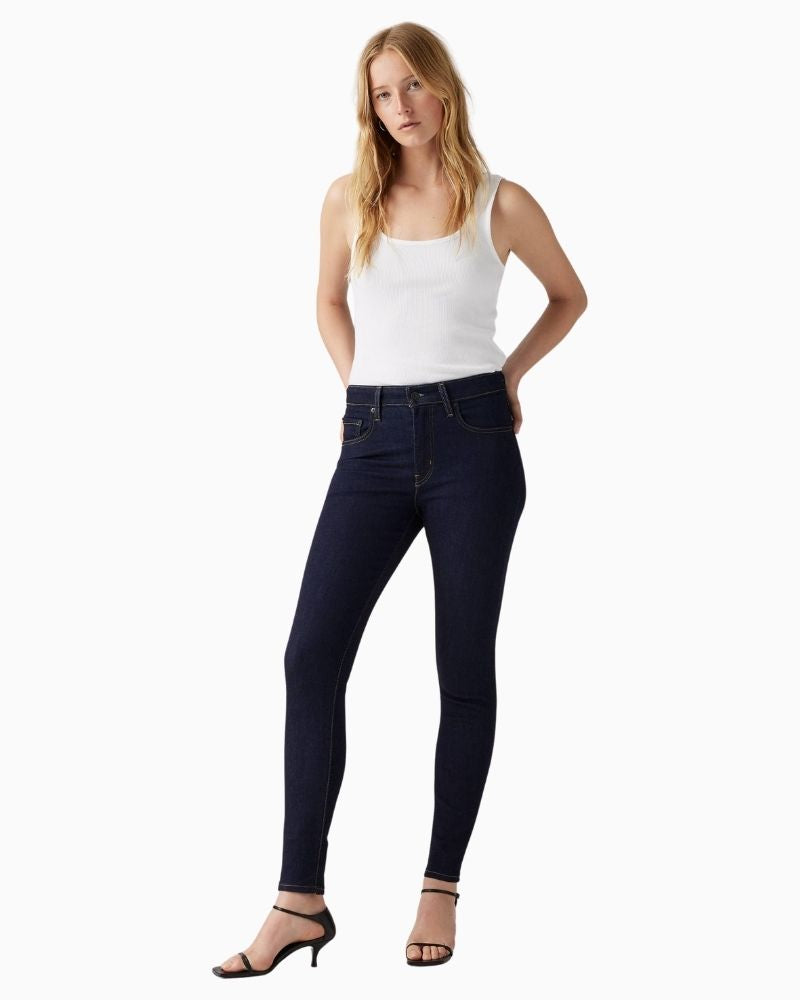 Front view Levi’s 721 high rise skinny jeans in blue stretch denim with zip fly and 5-pocket design