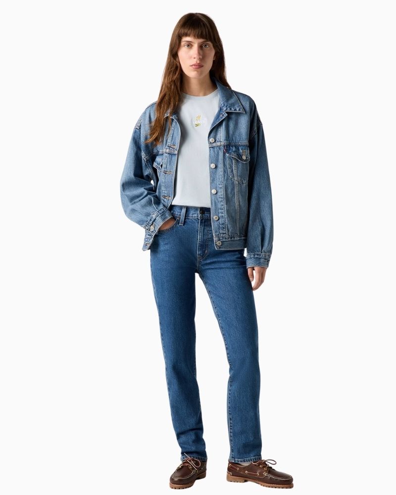 Front view Levi’s 724 jeans in classic blue vintage stretch denim with high rise and straight leg