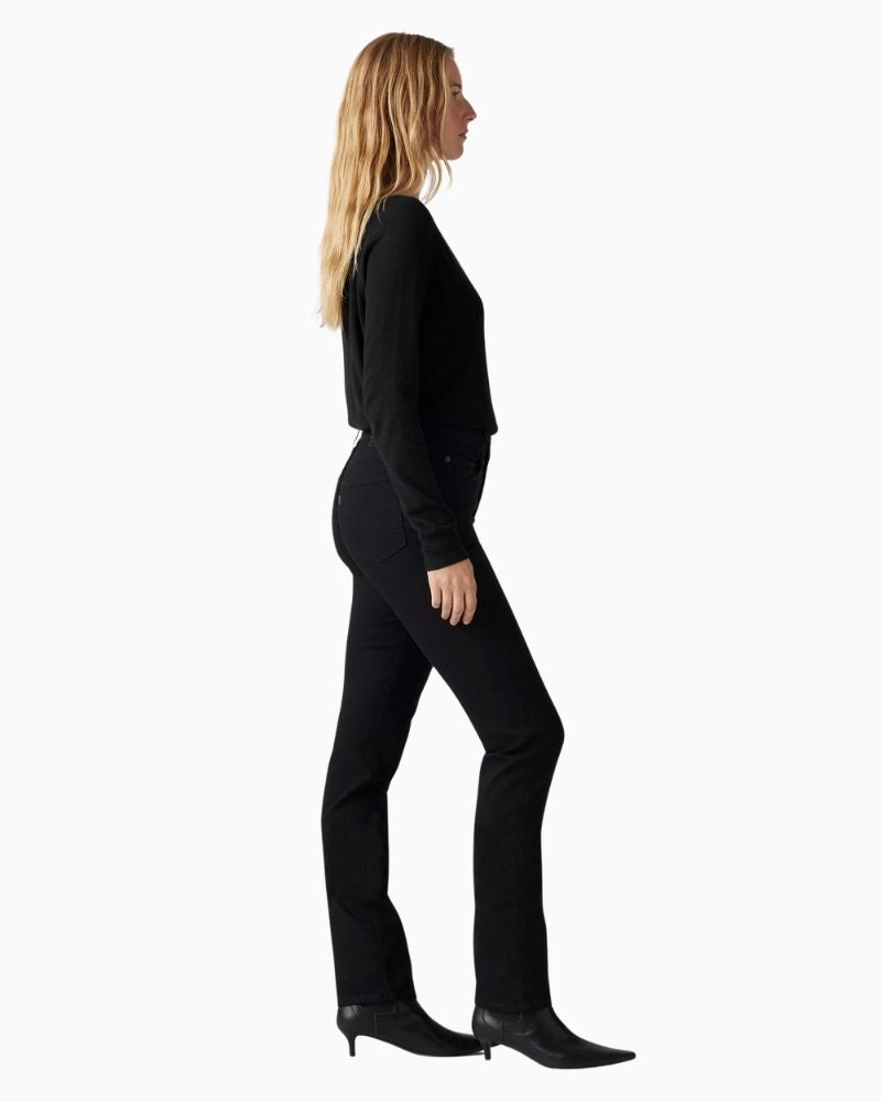 Side view of Levi’s 724 jeans showing slim fit through thigh and straight leg silhouette