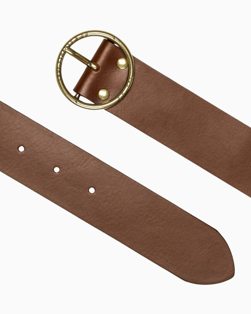 Close-up of Levi’s tan leather belt showing buckle and smooth finish