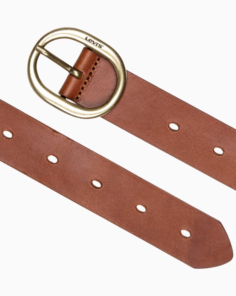 Close-up of Levi’s tan belt showing smooth leather and elegant buckle detail