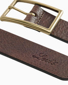 Close-up of brown leather belt showing 35mm width and classic finish