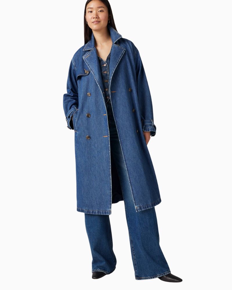 Model view of Levi’s trench showing standard fit and casual buttoned style