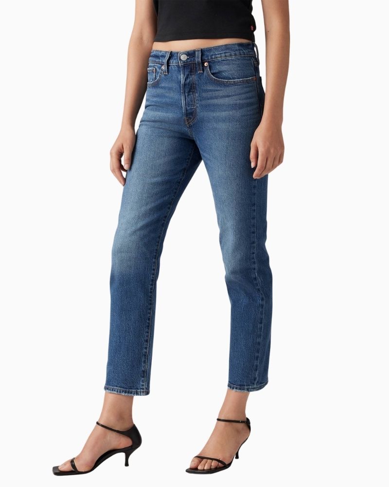 Straight leg high-rise jeans by Levi’s in faded blue stretch denim with button fly