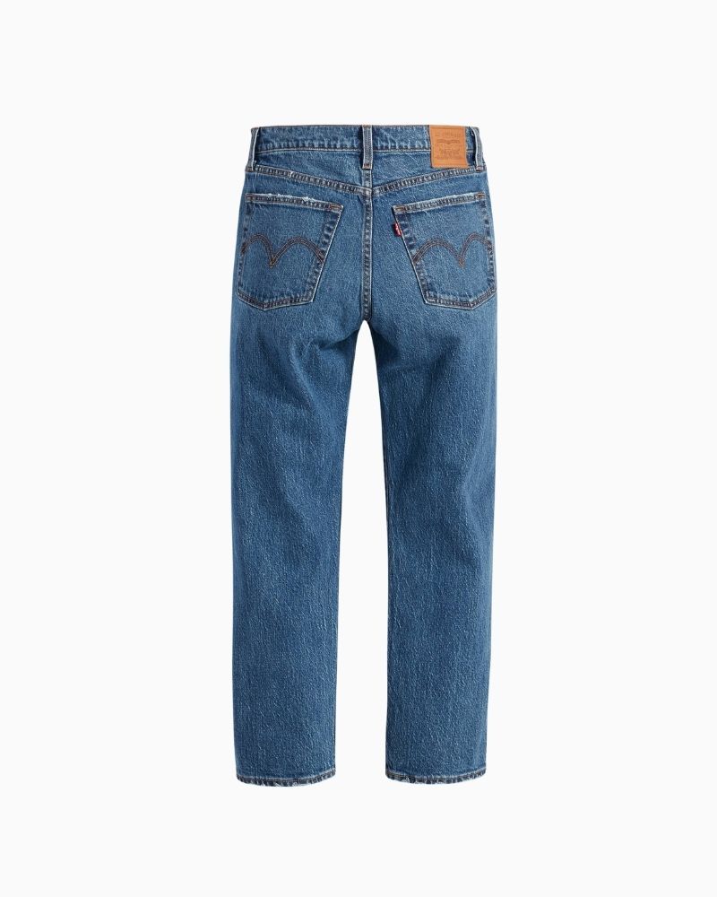 Back view of Straight leg high-rise jeans by Levi’s in faded blue stretch denim with button fly