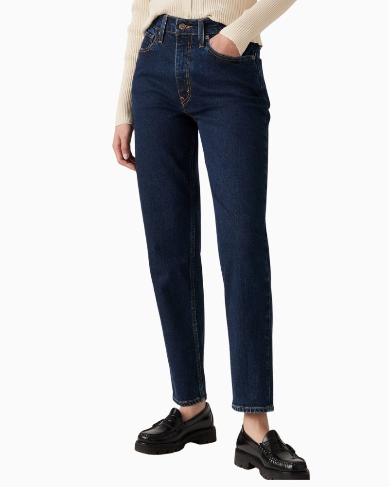 Levi’s 80s Mom jeans in mid-blue stretch denim with tapered leg and high-rise waist