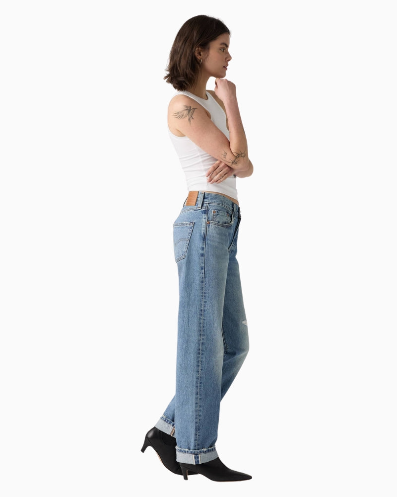 Side angle of 501 ‘90s jeans showing relaxed fit through hip and thigh in rigid cotton denim