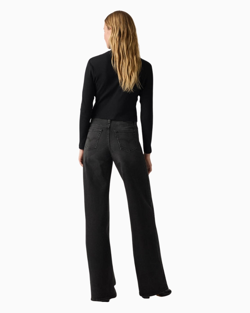 Back view of high-rise Levi’s jeans with 5-pocket design and structured shape