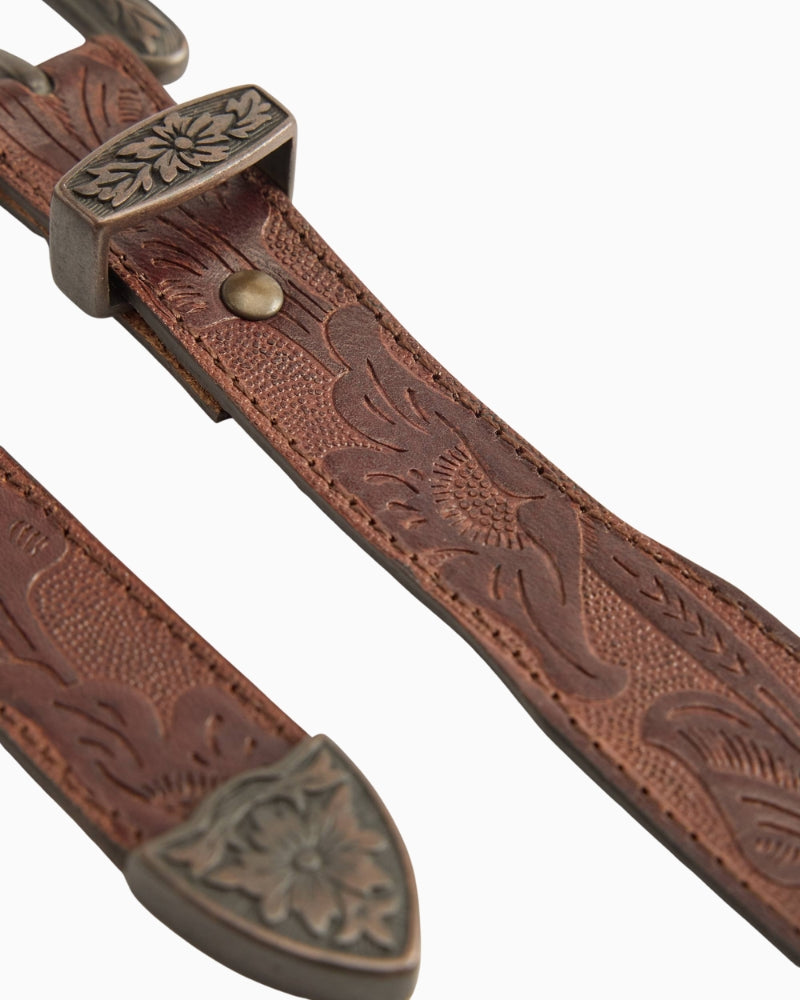 Close-up of hand-stained finish and classic metal buckle on Levi’s Rodeo belt