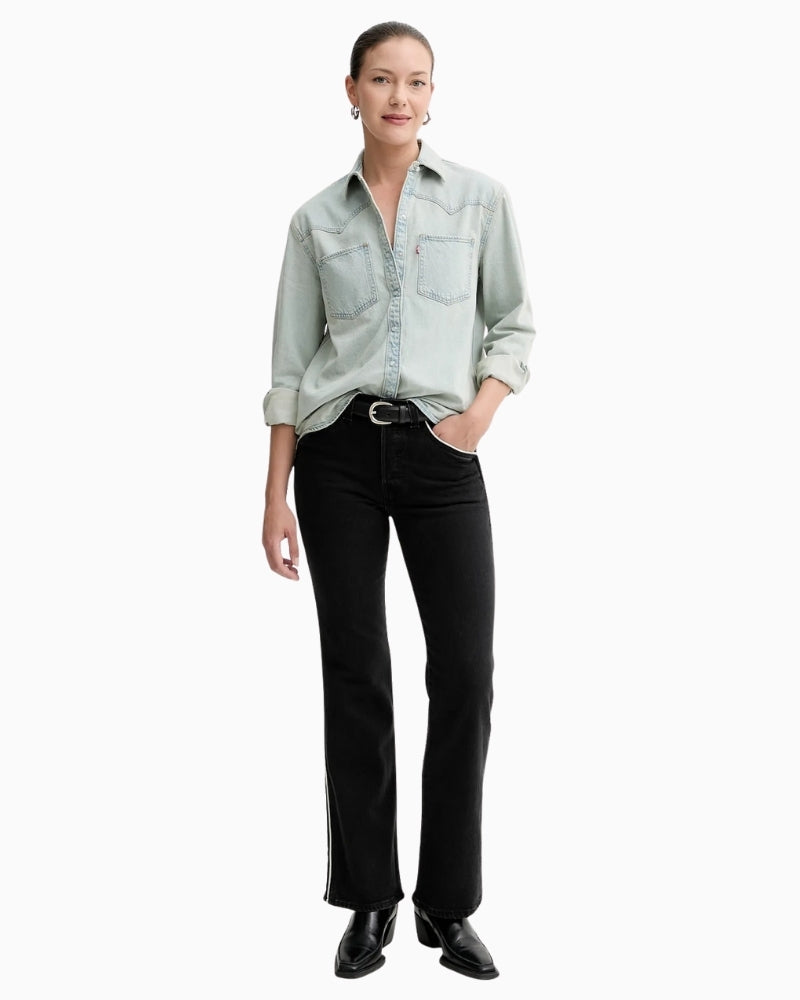Levi’s Wedgie high-rise bootcut jeans styled with casual trainers