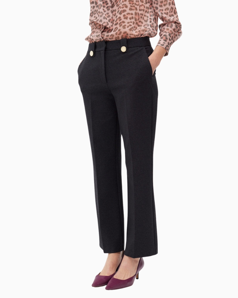 Elegant black knit trousers by Lola Casademunt with gold button detail