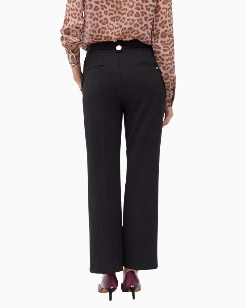 Back view of Lola Casademunt trousers showing smooth fit and finish