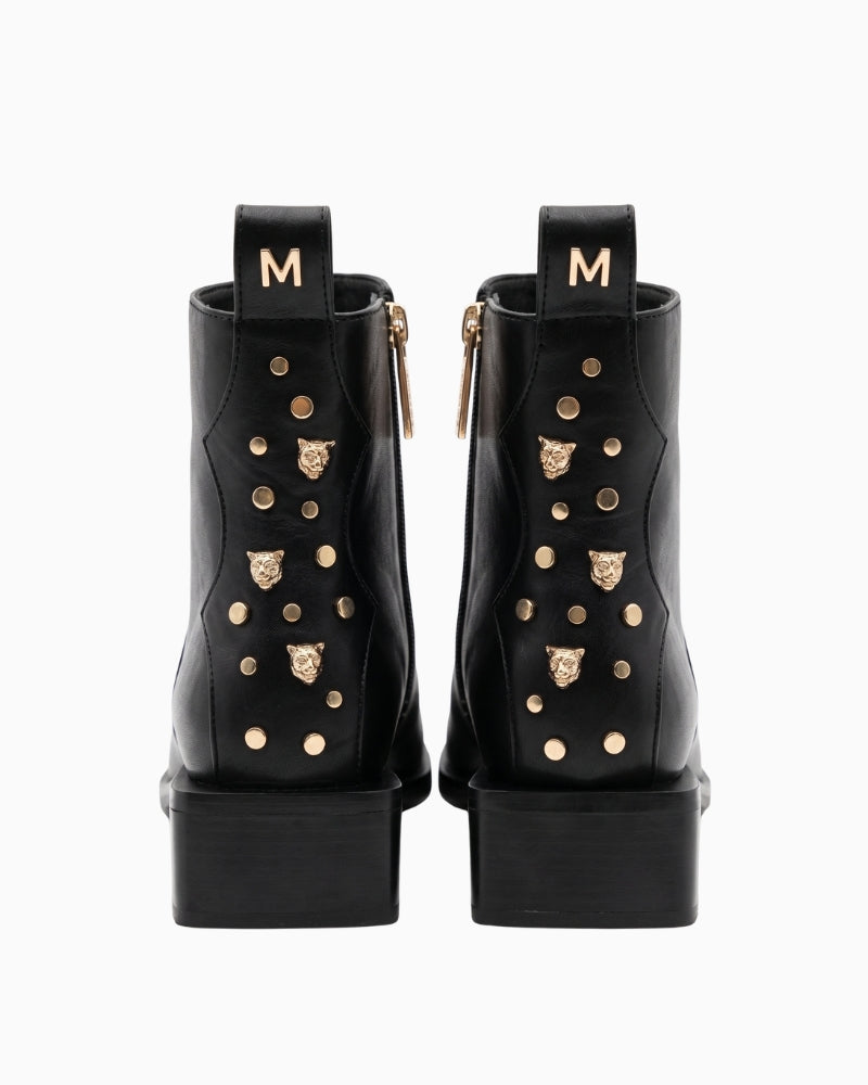 Lola Casademunt Cowboy Ankle Boot W/Studs in black back view with gold-tone studs and decorative
