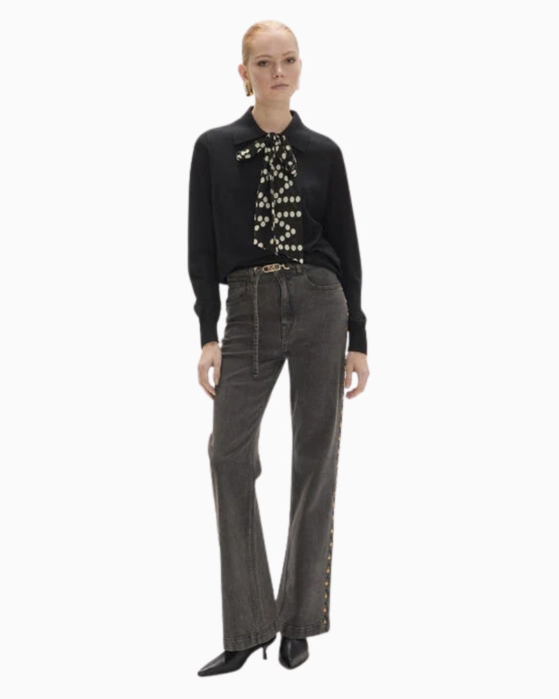 Lola Casademunt Jumper with Bow in black full-length styled with grey jeans