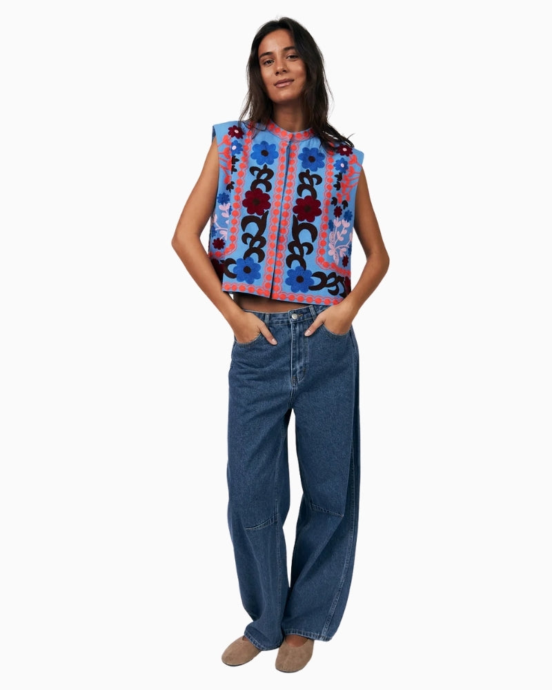 Woman wearing Lollys Laundry Bin blue embroidered vest – Áines Boutique