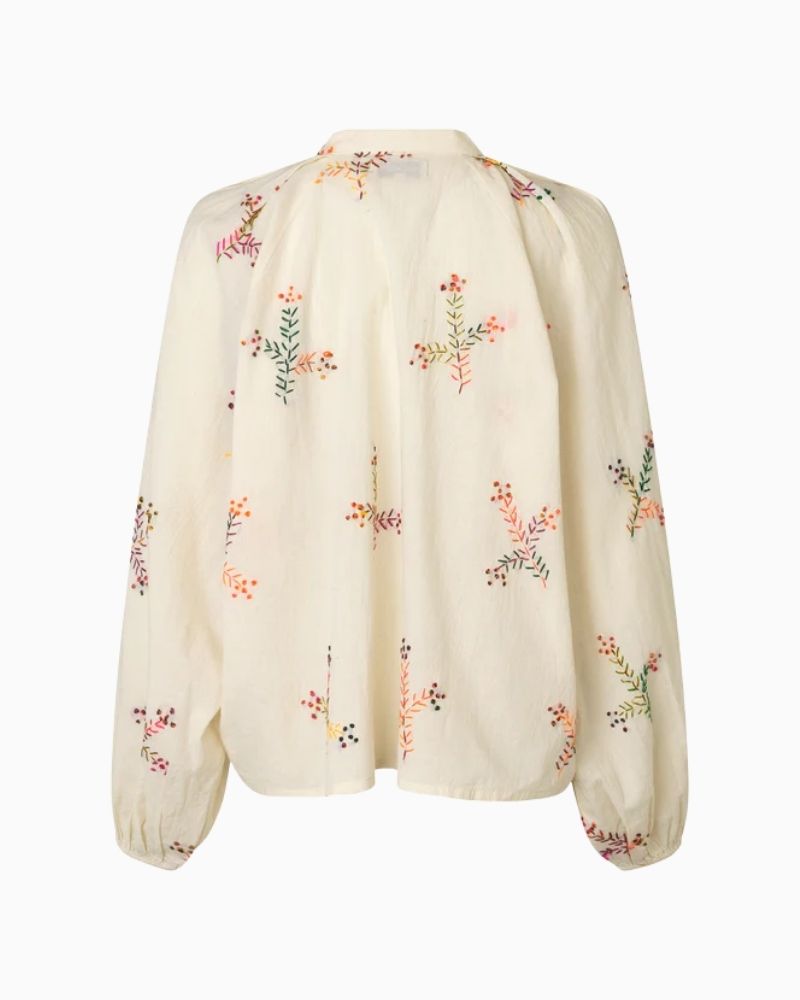 Back of embroidered cotton shirt with raglan sleeves and elasticated cuffs