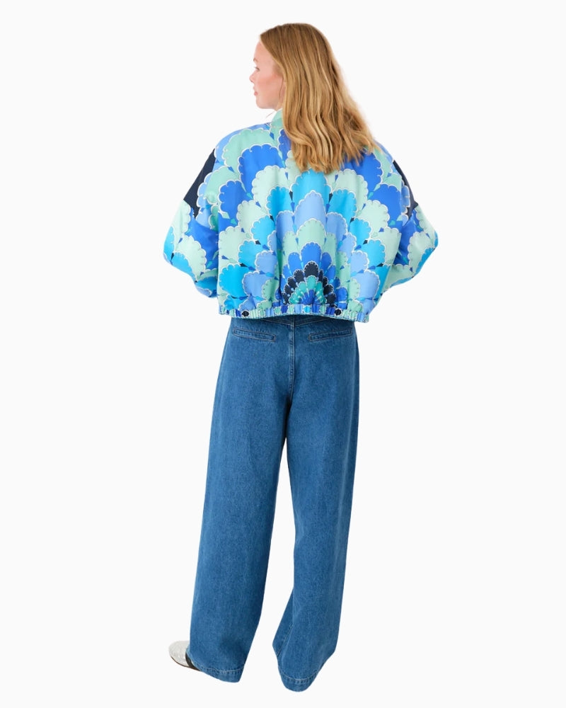 Back view of Lamall jacket showing short length and relaxed silhouette